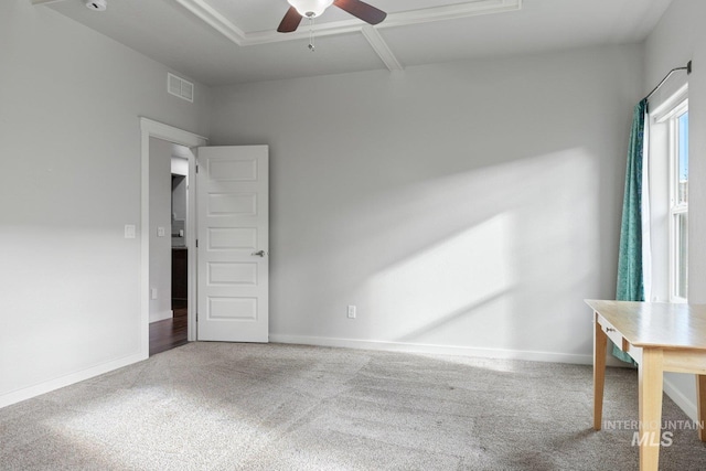 spare room with ceiling fan and carpet floors