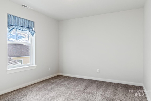 empty room featuring carpet