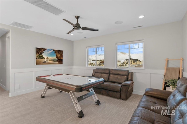 playroom with light colored carpet, a wainscoted wall, visible vents, and recessed lighting