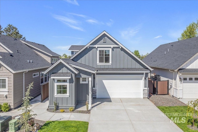375 N Sauer River Ln, Eagle, ID 83616 - craftsman house with board and batten siding, driveway, fence, and a garage