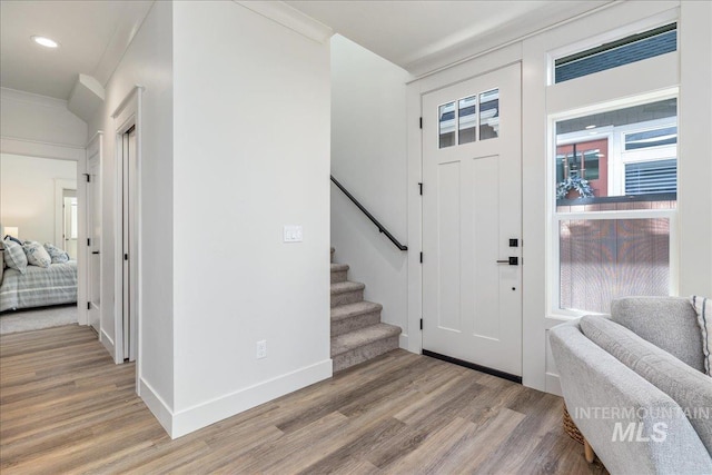 375 N Sauer River Ln, Eagle, ID 83616 - foyer entrance with light wood-style floors, stairway, baseboards, recessed lighting, and crown molding