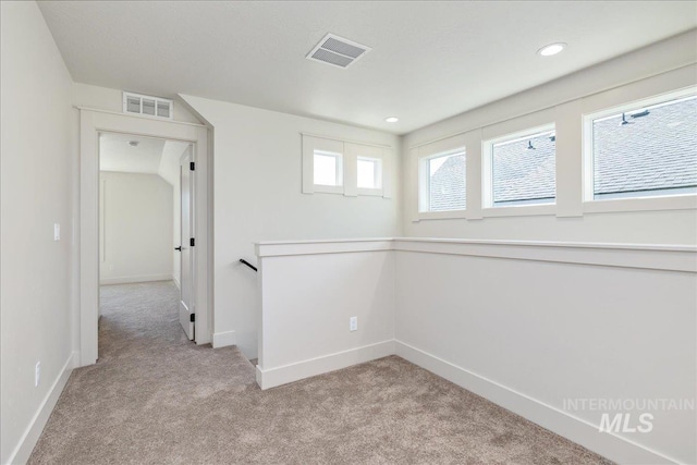 375 N Sauer River Ln, Eagle, ID 83616 - spare room with light carpet, baseboards, and recessed lighting