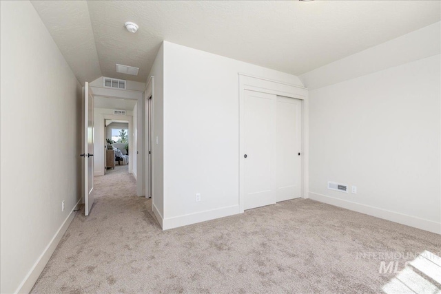 375 N Sauer River Ln, Eagle, ID 83616 - unfurnished bedroom with carpet floors, lofted ceiling, a closet, and baseboards