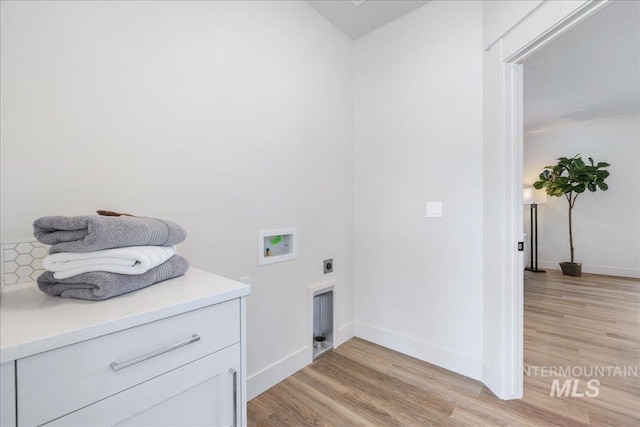 375 N Sauer River Ln, Eagle, ID 83616 - laundry area featuring hookup for a washing machine, hookup for an electric dryer, light wood-style floors, and baseboards