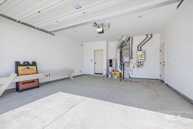375 N Sauer River Ln, Eagle, ID 83616 - garage with a garage door opener, water heater, and heating unit