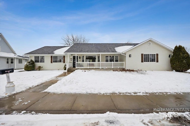 ranch-style home featuring a porch