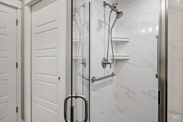 bathroom with an enclosed shower