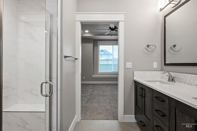 bathroom featuring vanity, tile patterned floors, an enclosed shower, and ceiling fan