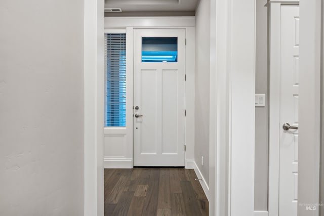 interior space with dark hardwood / wood-style flooring