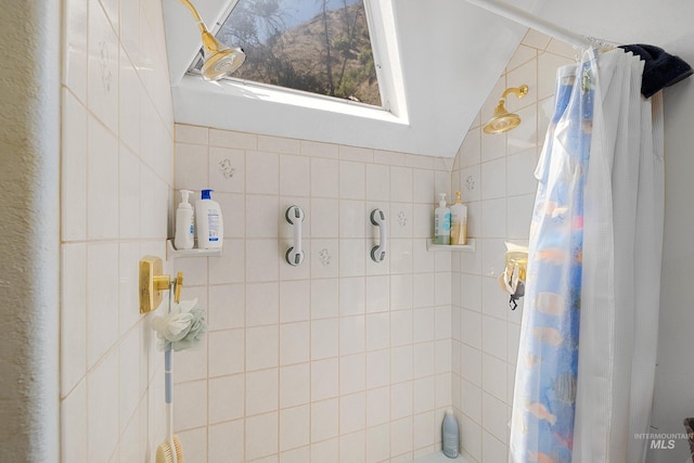 bathroom featuring vaulted ceiling