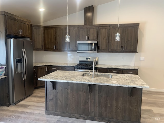 9585 W Sussex, Boise, ID 83704 - kitchen with a sink, appliances with stainless steel finishes, dark brown cabinetry, and light wood finished floors