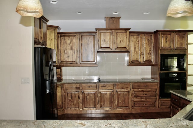 3349 E 4050 N, Twin Falls, ID 83301 - kitchen with black appliances, dark stone countertops, tasteful backsplash, dark wood-style flooring, and recessed lighting