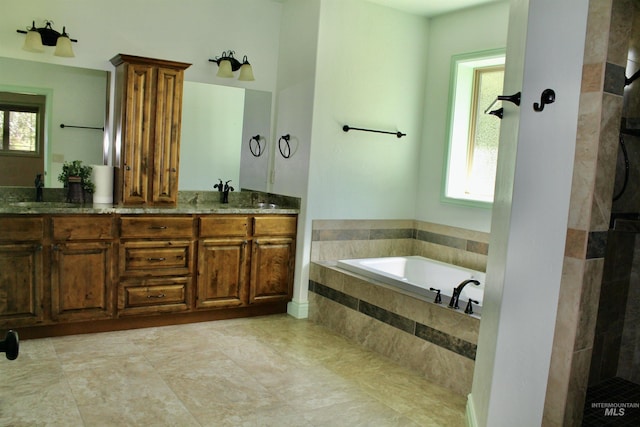 3349 E 4050 N, Twin Falls, ID 83301 - full bathroom featuring a garden tub, double vanity, and a tile shower