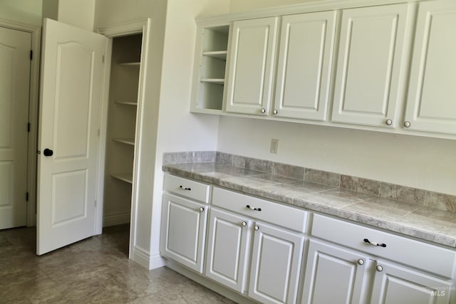 3349 E 4050 N, Twin Falls, ID 83301 - kitchen featuring open shelves, white cabinets, and tile countertops