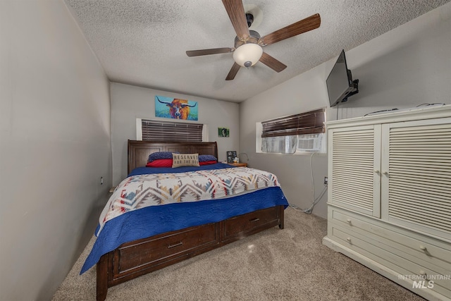 1025 W Galloway Ave, Weiser, ID 83672 - carpeted bedroom with a textured ceiling and ceiling fan
