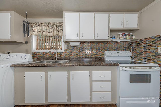 1025 W Galloway Ave, Weiser, ID 83672 - kitchen with electric stove, washer / dryer, tasteful backsplash, white cabinetry, and dark countertops