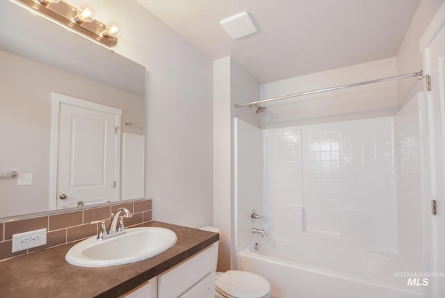 3749 E Rock Falls St, Nampa, ID 83686 - full bath with bathtub / shower combination, toilet, vanity, and tasteful backsplash