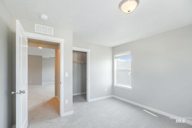 3749 E Rock Falls St, Nampa, ID 83686 - unfurnished bedroom featuring light colored carpet, baseboards, visible vents, and a closet
