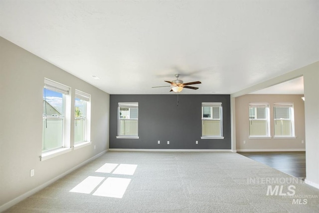 3749 E Rock Falls St, Nampa, ID 83686 - carpeted empty room with baseboards and a ceiling fan
