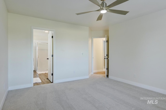 12335 W Red Spruce, Boise, ID 83713 - unfurnished bedroom with carpet floors, connected bathroom, and a ceiling fan