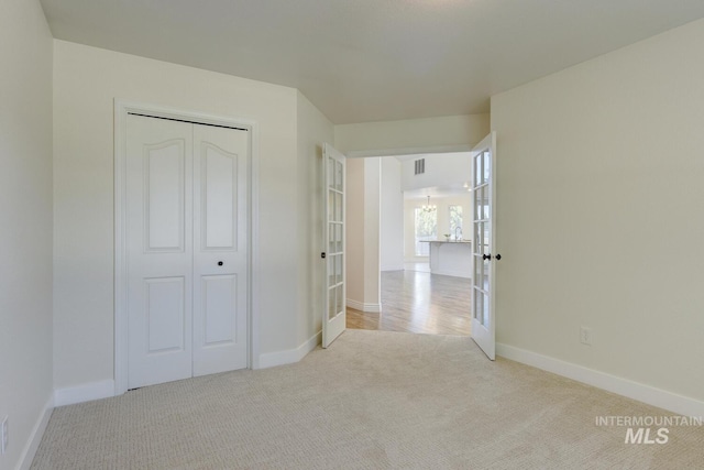 12335 W Red Spruce, Boise, ID 83713 - unfurnished bedroom featuring carpet floors and a closet