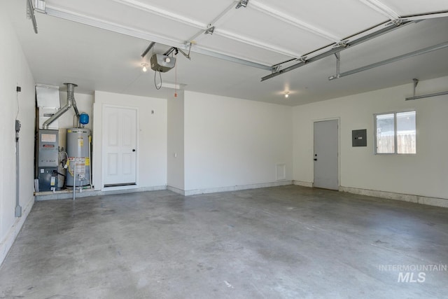 12335 W Red Spruce, Boise, ID 83713 - garage featuring gas water heater, electric panel, a garage door opener, and heating unit