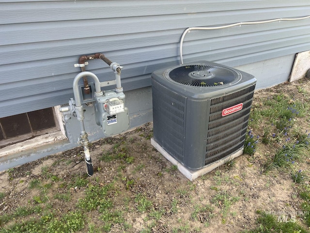 exterior details with cooling unit and gas meter