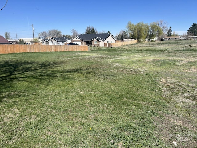 view of yard featuring fence