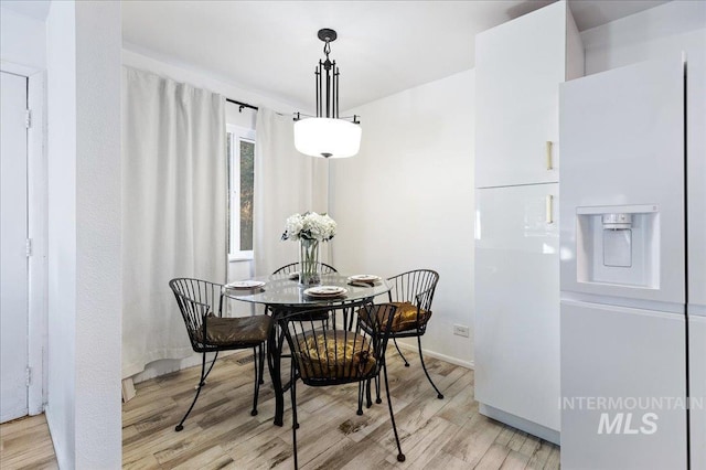 dining area featuring light hardwood / wood-style flooring