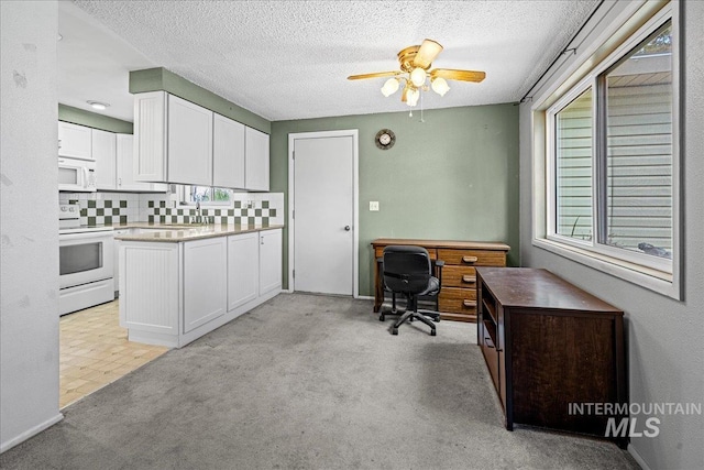 1267 NW Beaman St, Mountain Home, ID 83647 - office area with a ceiling fan, a textured ceiling, and light carpet