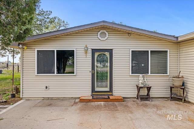1267 NW Beaman St, Mountain Home, ID 83647 - view of front of home featuring a patio area