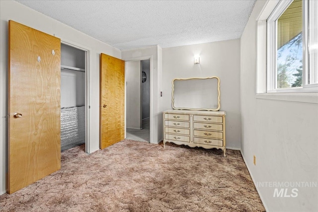 1267 NW Beaman St, Mountain Home, ID 83647 - bedroom with carpet flooring, a closet, and a textured ceiling