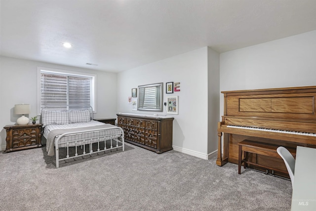 bedroom with carpet flooring and baseboards