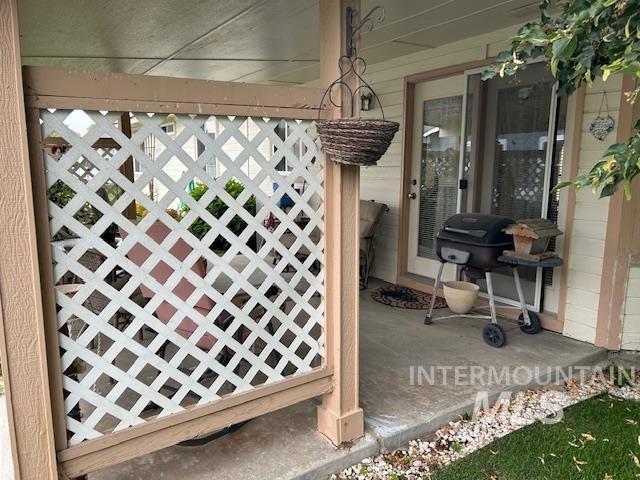 1100 Burnett Dr Unit 348, Nampa, ID 83651 - view of patio / terrace featuring a porch and grilling area