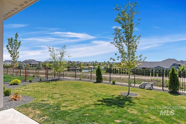 view of yard featuring a residential view