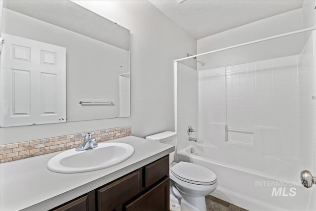 full bath with toilet, shower / bath combination, and vanity