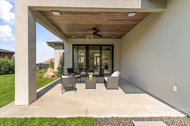 view of patio featuring ceiling fan and an outdoor hangout area