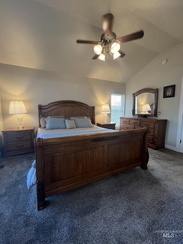 140 W Valley Rd, Hagerman, ID 83332 - bedroom featuring dark colored carpet, lofted ceiling, ceiling fan, and baseboards