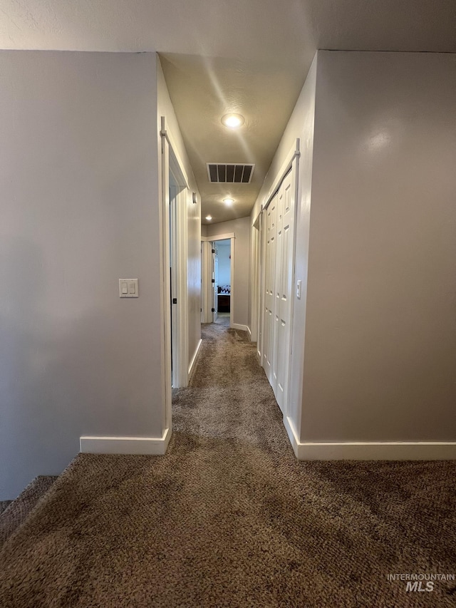 140 W Valley Rd, Hagerman, ID 83332 - corridor featuring carpet flooring, baseboards, and recessed lighting
