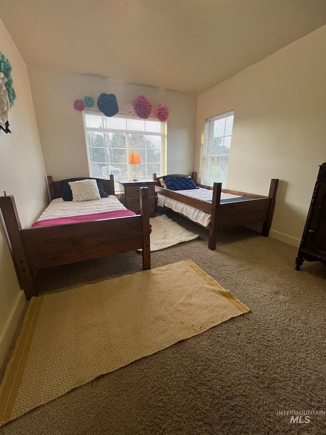 140 W Valley Rd, Hagerman, ID 83332 - bedroom with carpet floors and baseboards