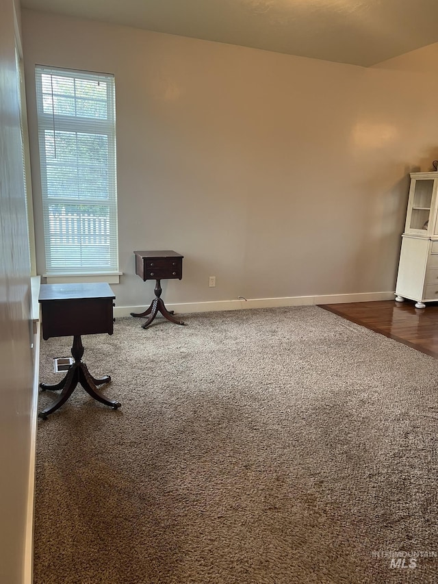 140 W Valley Rd, Hagerman, ID 83332 - unfurnished room featuring dark carpet and baseboards