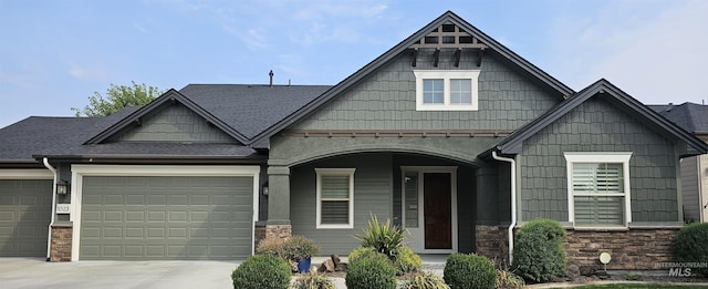 craftsman house with a garage