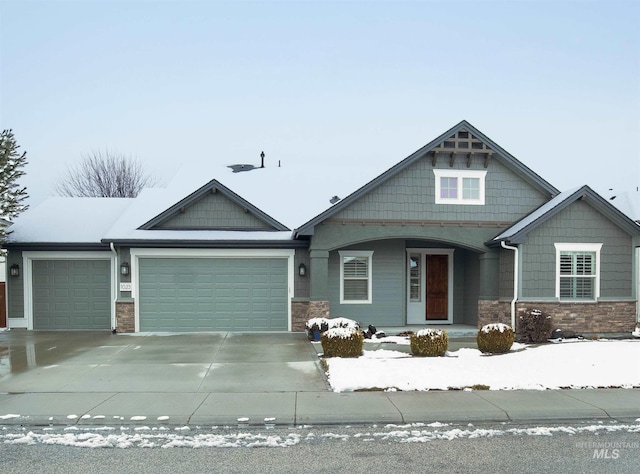 craftsman inspired home featuring a garage