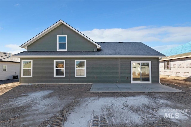 back of house with central AC unit and a patio area