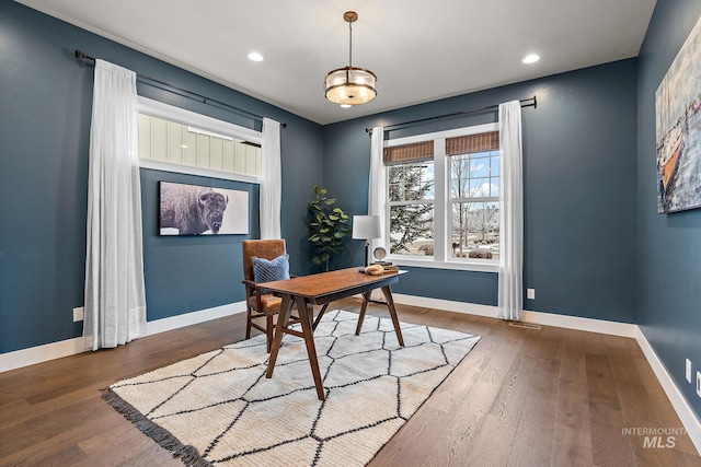 office area featuring hardwood / wood-style flooring and a chandelier
