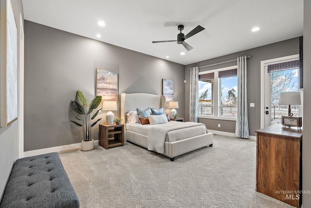 bedroom with access to outside, ceiling fan, and light colored carpet