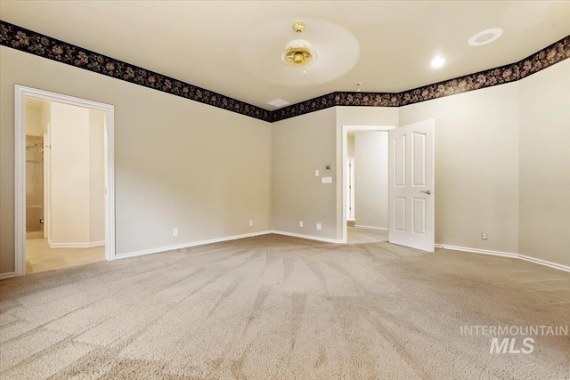 spare room with carpet floors