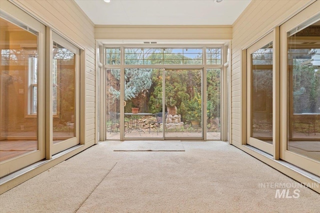 view of unfurnished sunroom