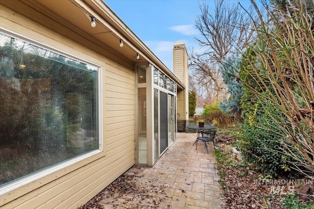 view of home's exterior featuring a patio area