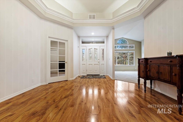 entryway with light hardwood / wood-style floors